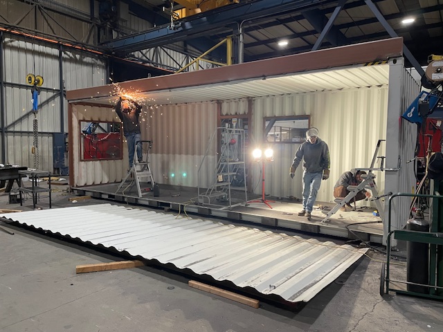 Two RiseCon employees building a San Diego prefab ADU.