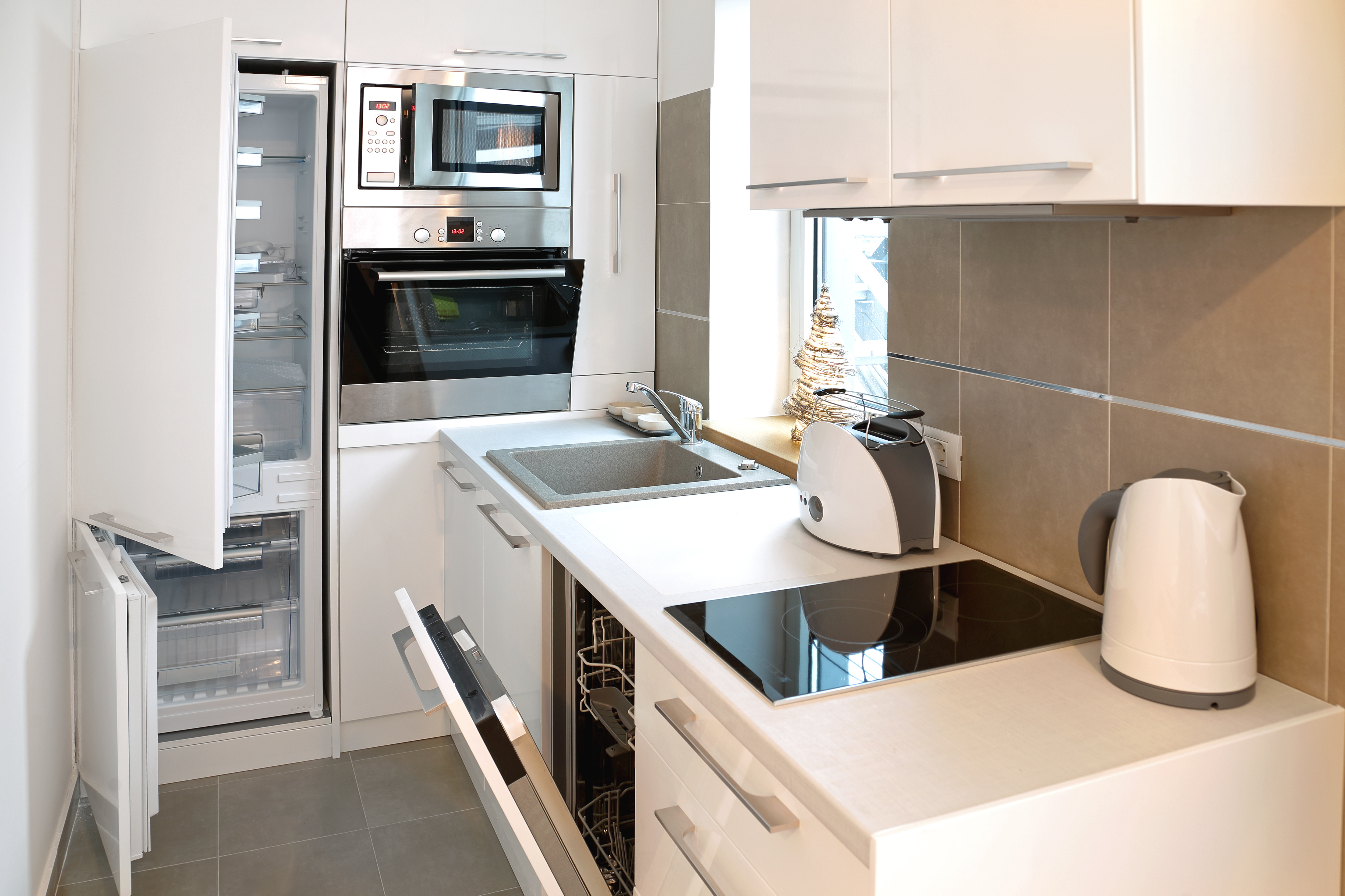 A kitchen inside a RiseCon North America D series ADU.